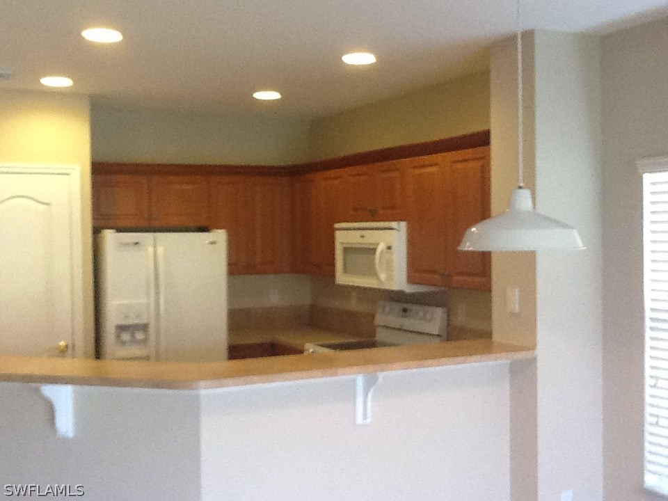11701 Eros Road Lehigh Acres, FL 33971 - Photo 4 of 15 Gallery Image 4