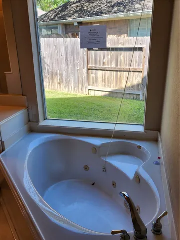 a bathroom with a bathtub