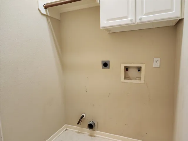a bathroom with a sink and vanity