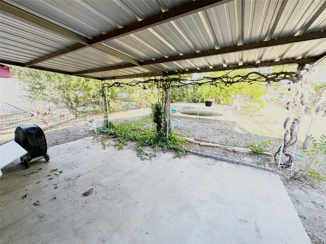 a view of house with outdoor seating
