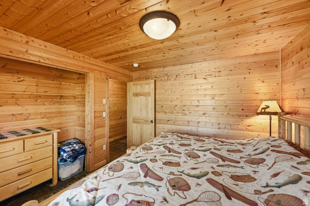 2096 South Aspen Ridge Coalville, UT 84017 - Photo 23 of 44 Interior room featuring extensive wood paneling on walls and ceiling