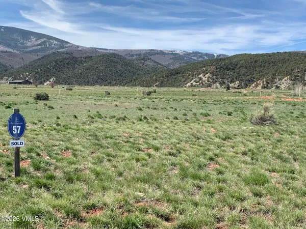 a view of a mountain with a outdoor space