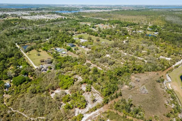 a view of a yard with an outdoor space