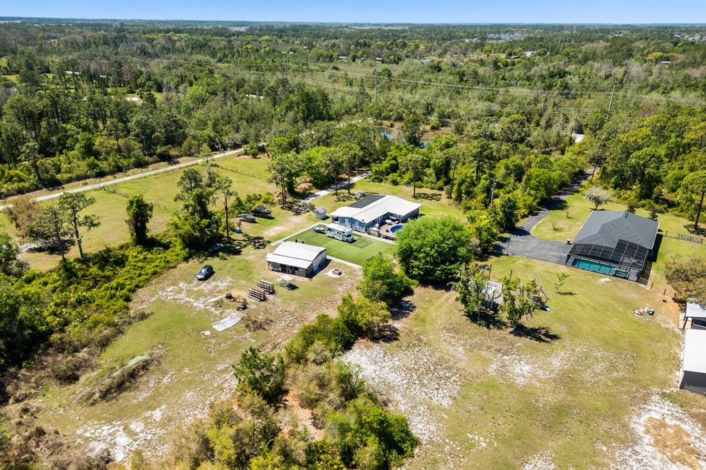 2727 Absher Road St. Cloud, FL 34771 - Photo 9 of 12 view of outdoor space and yard