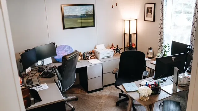 a work room with furniture and wooden floor