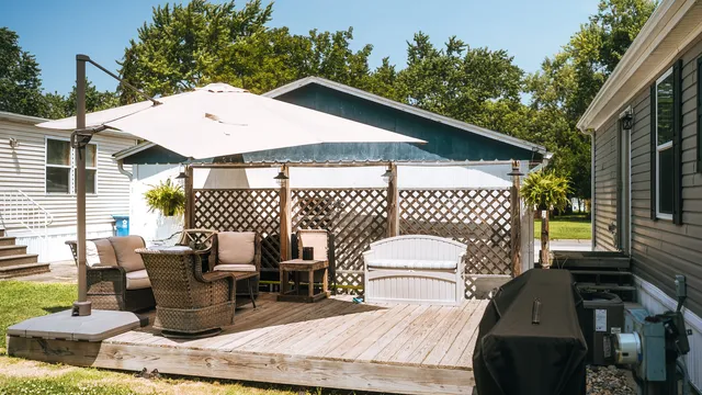 a patio with table and chairs