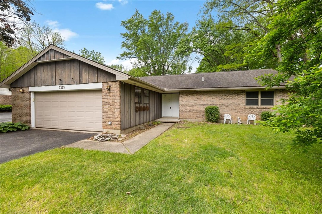 7225 Garber Road Clayton, OH 45415 - Photo 6 of 33 This charming residence features a well-maintained exterior and a welcoming entryway.