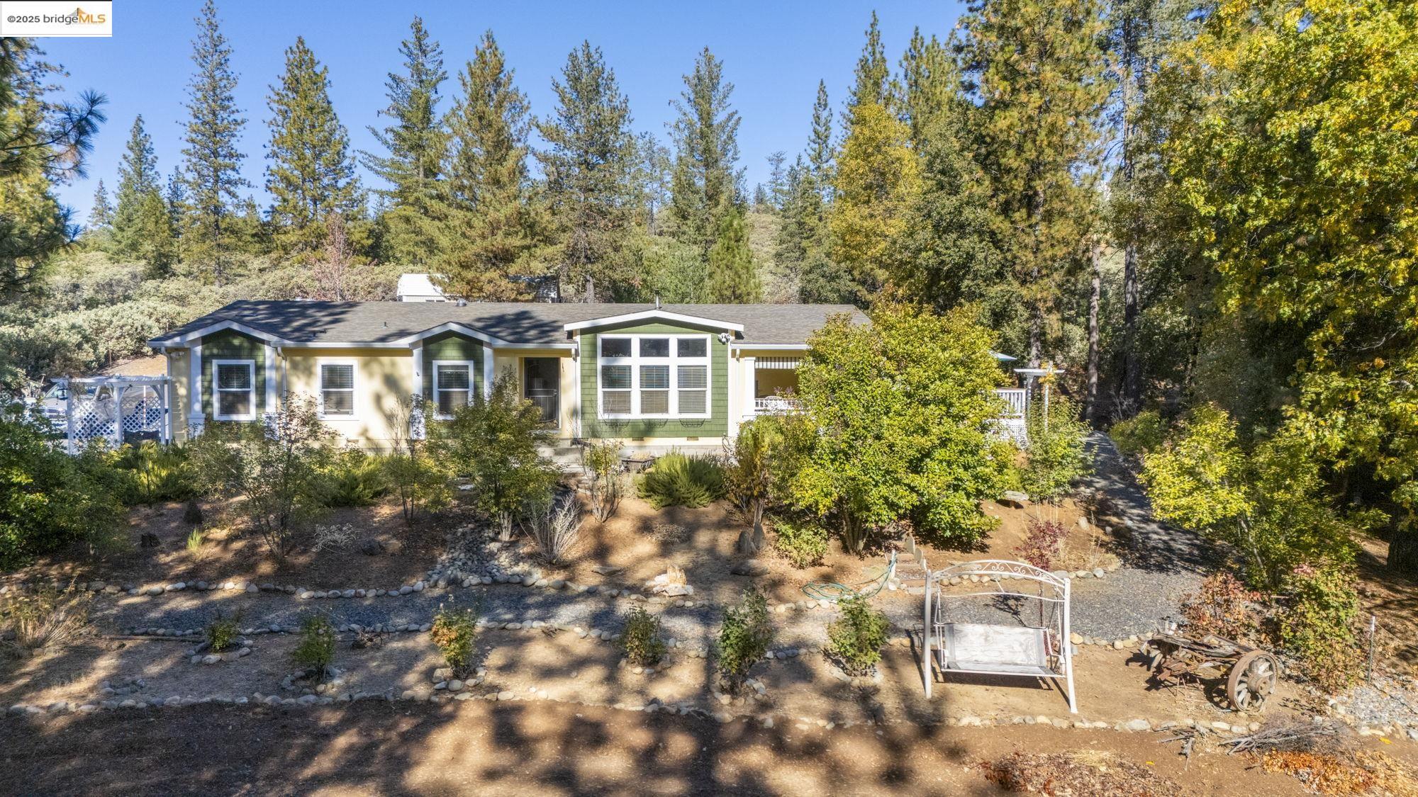 10893 Merrell Road Groveland, CA 95321 - Photo 1 of 1 View of front facade with a gate