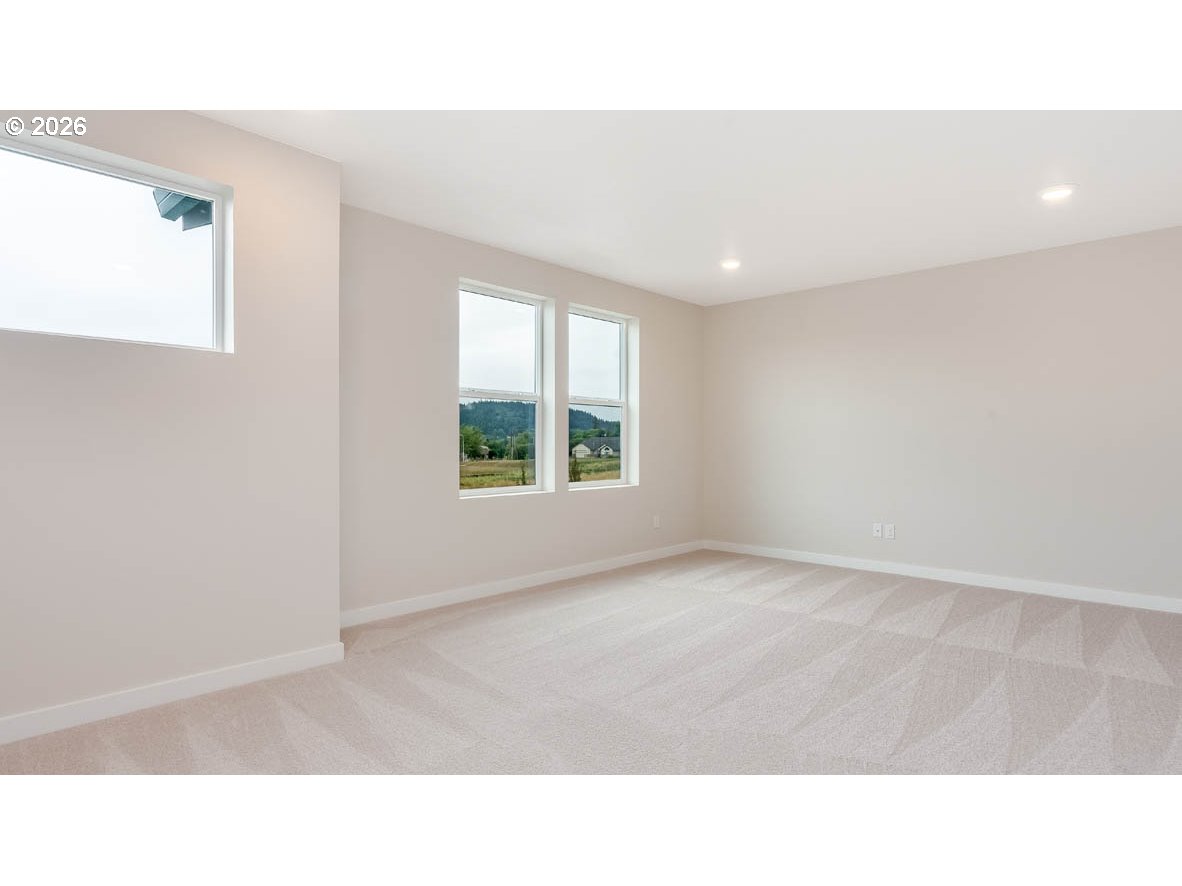 9194 Southeast Azalea Street Happy Valley, OR 97086 - Photo 19 of 32 a open hall with a window