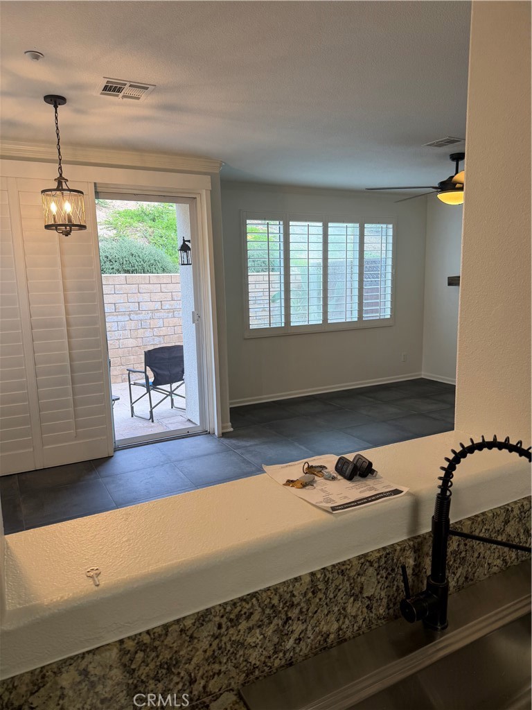 39246 Mango Bay, Unit B Murrieta, CA 92563 - Photo 5 of 29 Kitchen open to living room