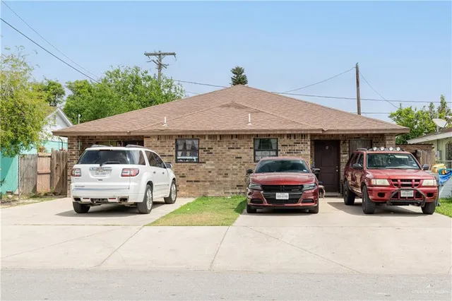 a car parked in front of a house