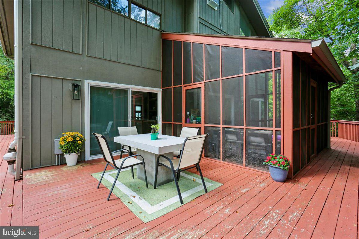7614 Carteret Road Bethesda, MD 20817 - Photo 25 of 31 Charming screened porch for outdoor bliss.