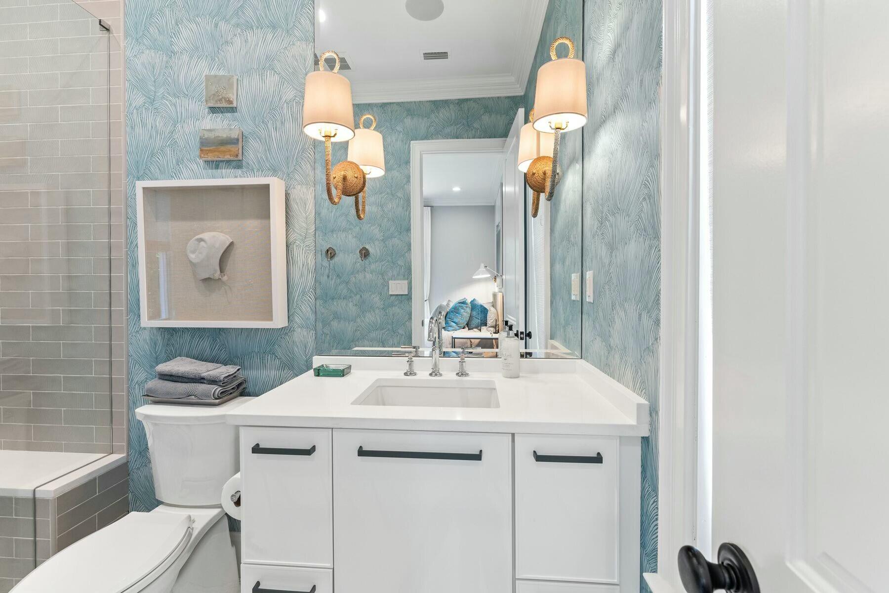 3121 Merion Drive Miramar Beach, FL 32550 - Photo 39 of 54 a bathroom with a sink vanity and a mirror