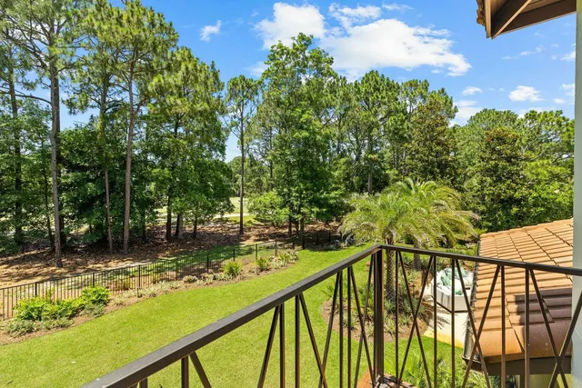 a bathroom with a sink vanity mirror and toilet