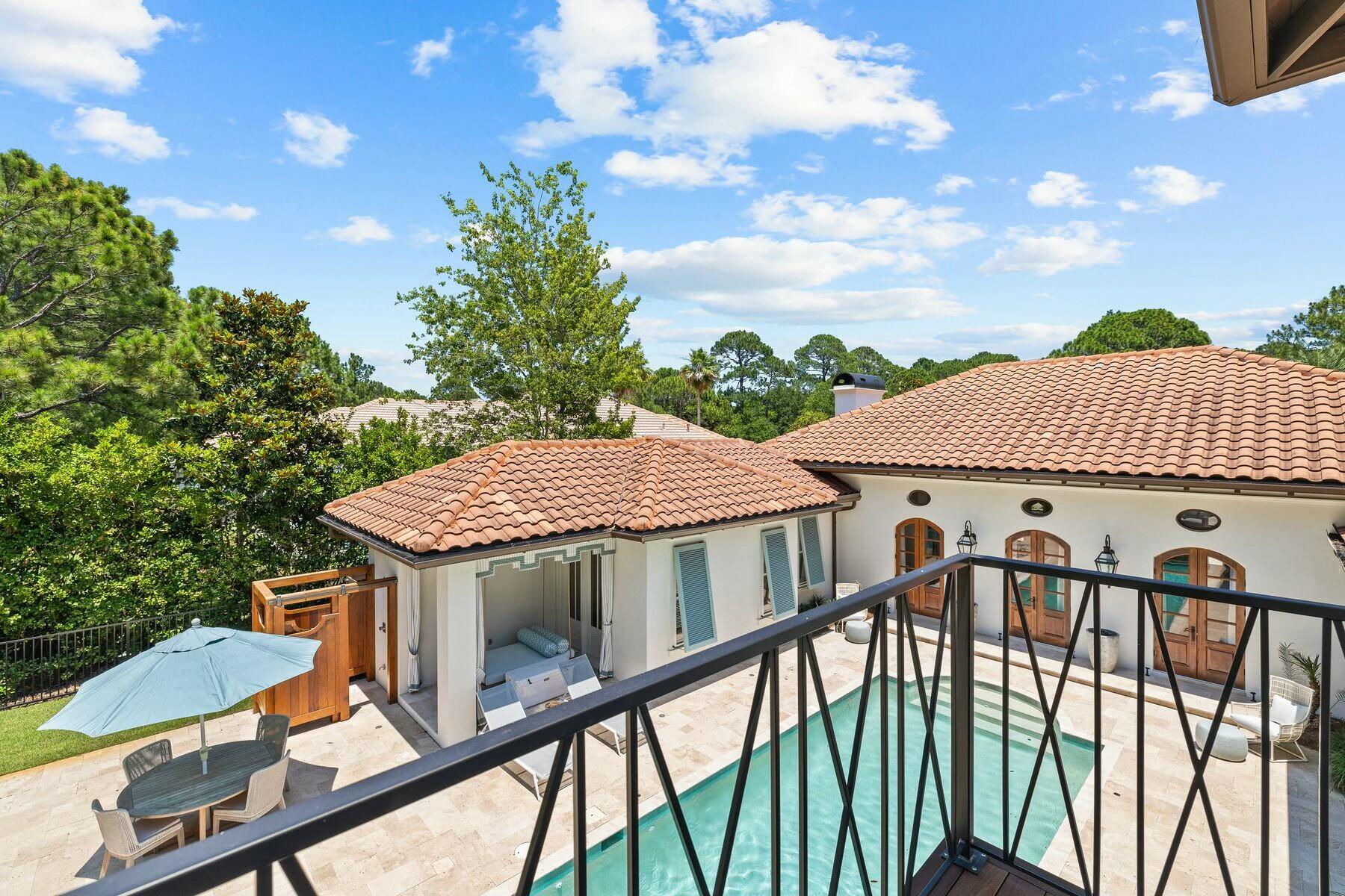 3121 Merion Drive Miramar Beach, FL 32550 - Photo 42 of 54 a view of a patio with a table and chairs