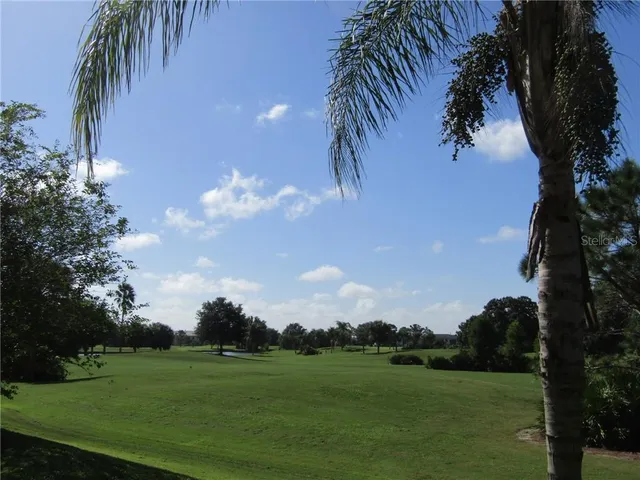 a view of a big yard with a garden
