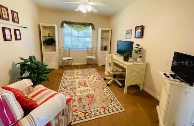 a bedroom with a bed and flat screen tv