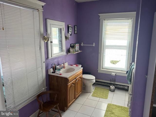 122 Arlington Street Reading, PA 19611 - Photo 11 of 15 a bathroom with a sink a toilet and window