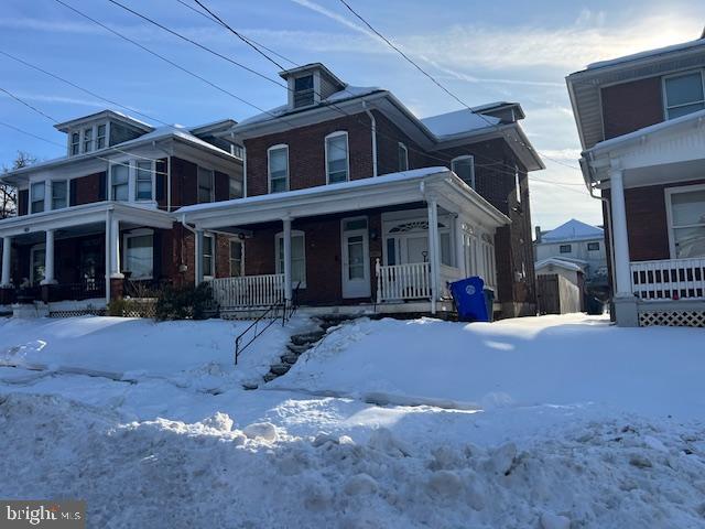 122 Arlington Street Reading, PA 19611 - Photo 2 of 15 a front view of a house with a yard