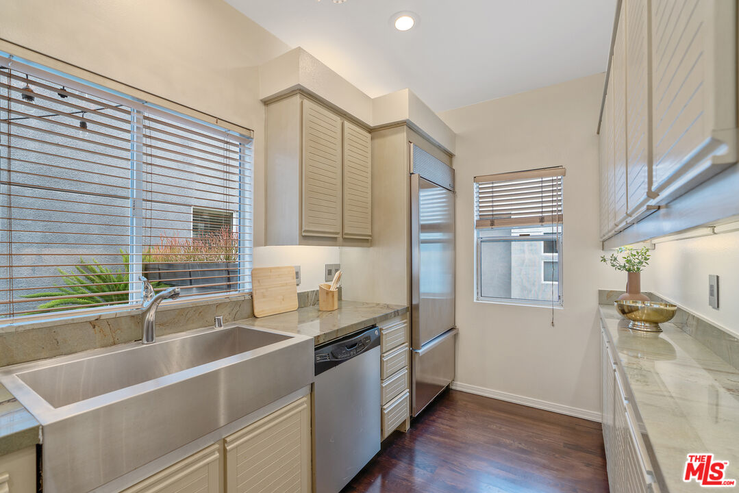 2131 Griffith Park Boulevard Los Angeles, CA 90039 - Photo 13 of 42 a kitchen with a sink cabinets and window