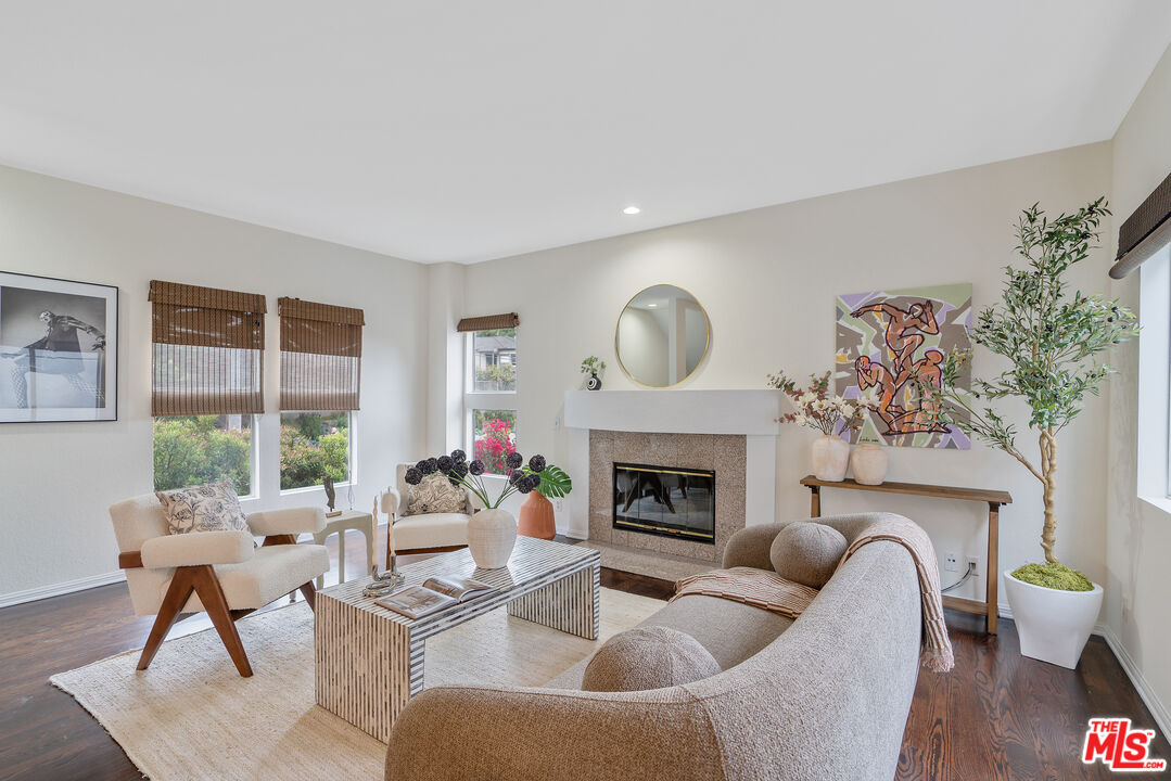 2131 Griffith Park Boulevard Los Angeles, CA 90039 - Photo 3 of 42 a living room with furniture and a fireplace