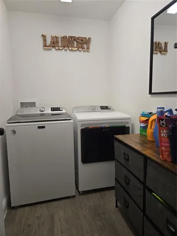 a utility room with washer and dryer