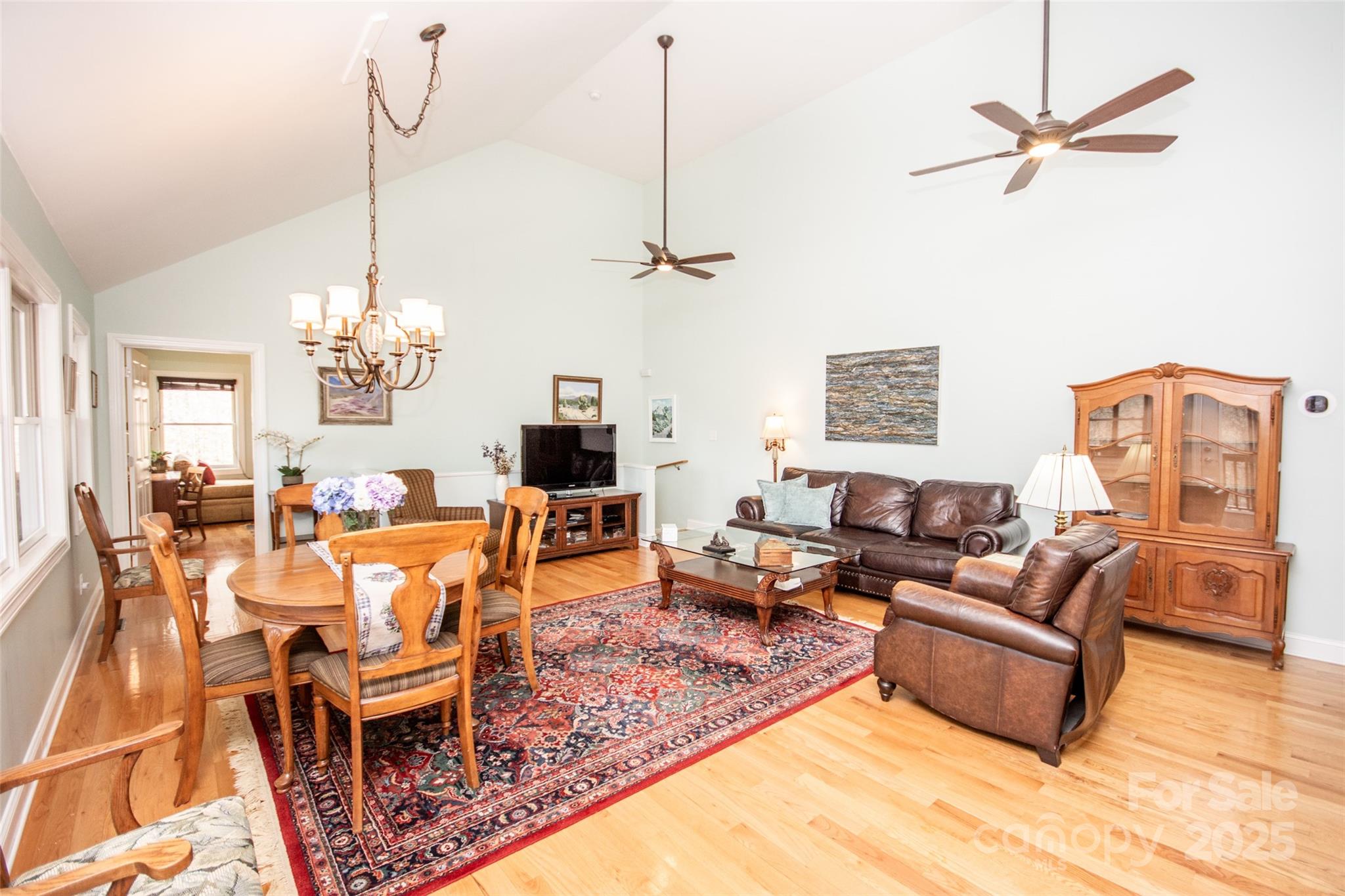 985 Roberson School Road Moravian Falls, NC 28654 - Photo 17 of 48 a living room with furniture a chandelier and a window