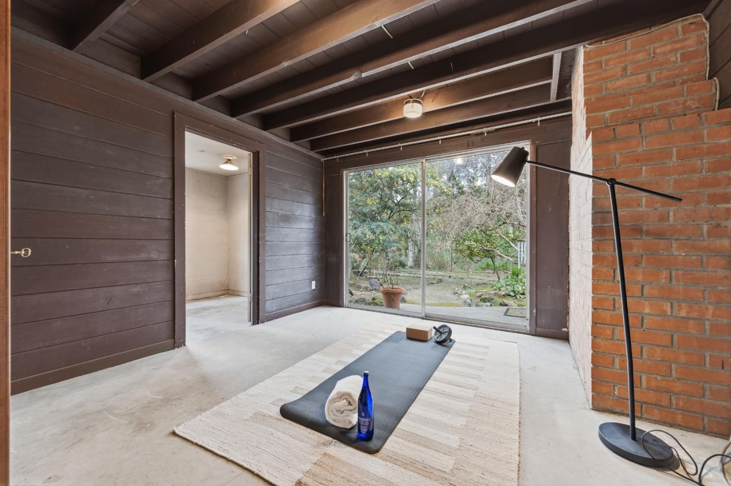 1698 Cordilleras Road Redwood City, CA 94062 - Photo 28 of 44 a large room with a large window