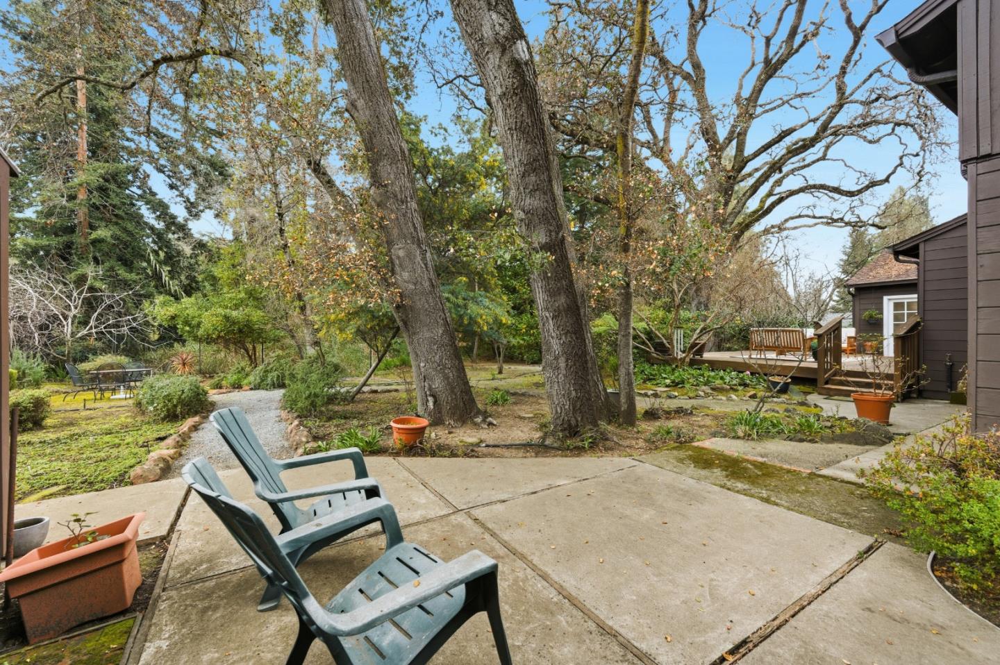 1698 Cordilleras Road Redwood City, CA 94062 - Photo 32 of 44 a view of a backyard with sitting area