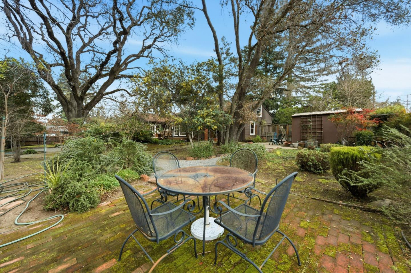 1698 Cordilleras Road Redwood City, CA 94062 - Photo 34 of 44 a swimming pool with outdoor seating and yard