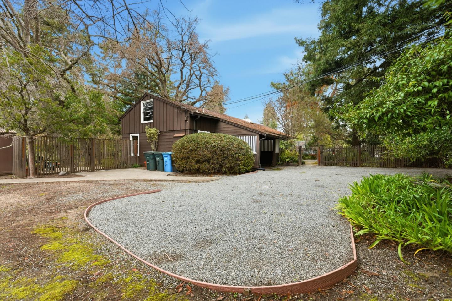 1698 Cordilleras Road Redwood City, CA 94062 - Photo 39 of 44 a view of a backyard with large trees
