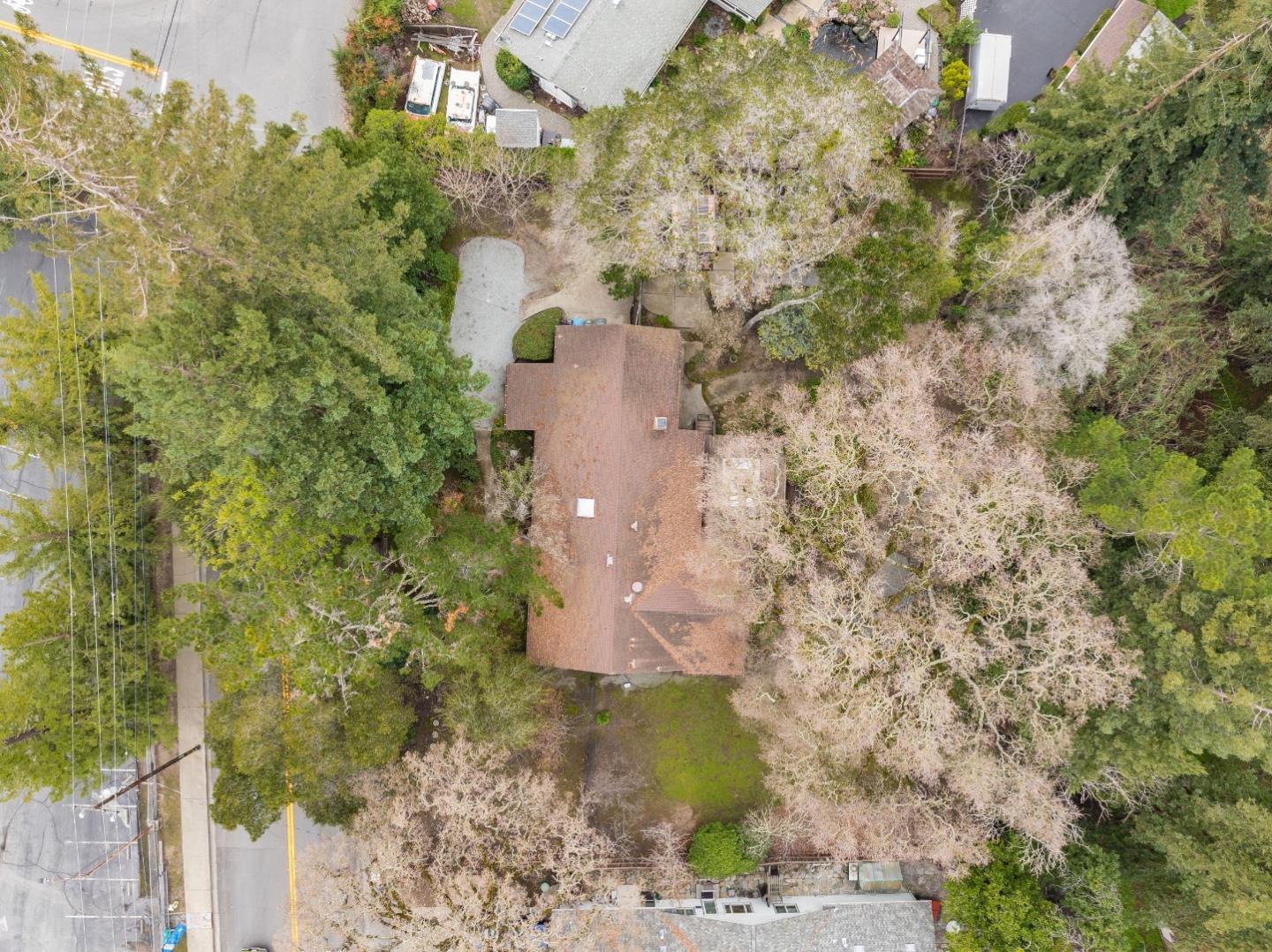 1698 Cordilleras Road Redwood City, CA 94062 - Photo 40 of 44 a aerial view of a house with a yard