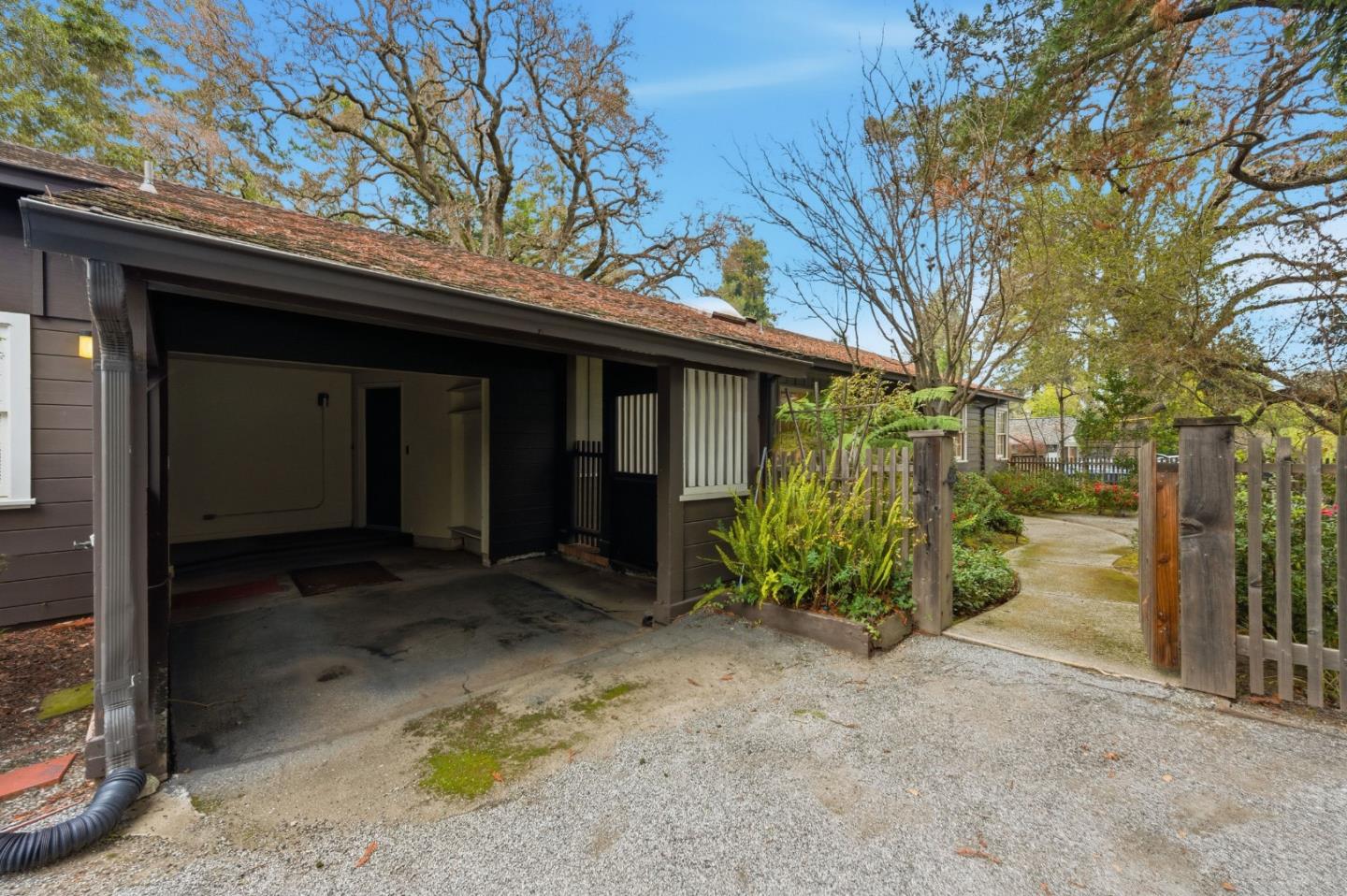 1698 Cordilleras Road Redwood City, CA 94062 - Photo 4 of 44 a view of a house with a yard