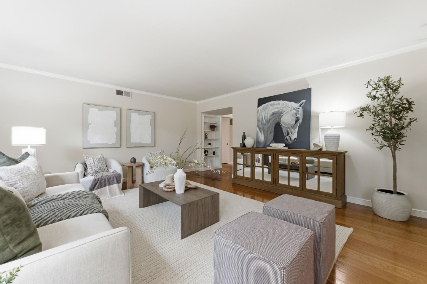 1698 Cordilleras Road Redwood City, CA 94062 - Photo 7 of 44 a living room with furniture and a wooden floor