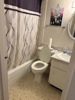 a bathroom with a toilet and a sink