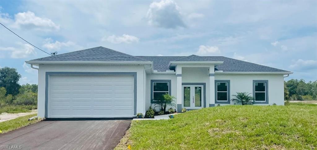 front view of a house with a yard