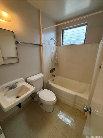a bathroom with a sink and a bathtub