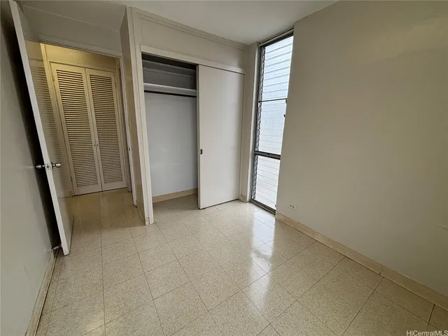 a view of a living room with furniture