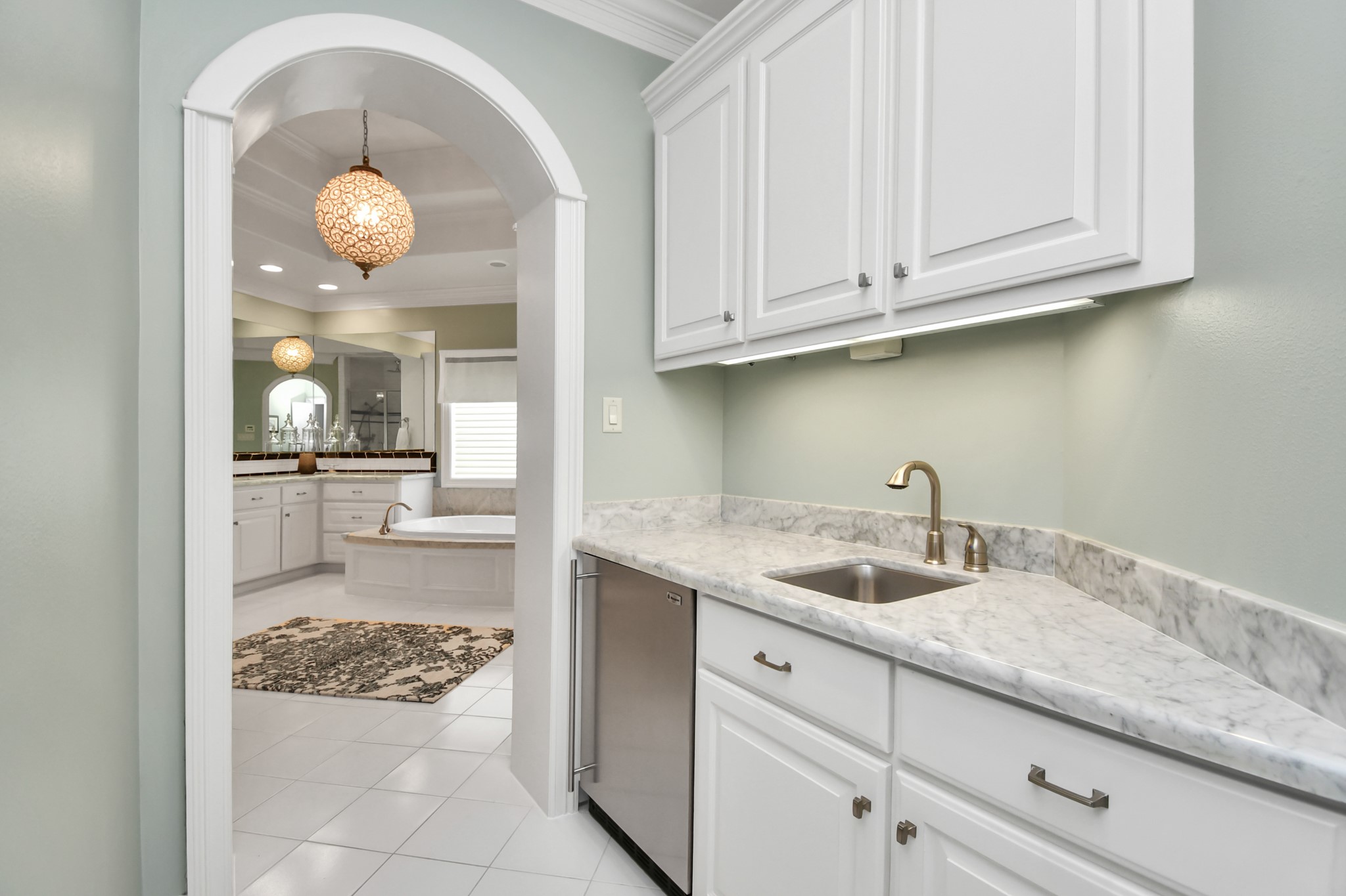 3739 Westerman Street Houston, TX 77005 - Photo 23 of 44 Beverage bar between the primary bedroom and bathroom, perfect to make your coffee in the morning and then relax on the upstairs balcony.