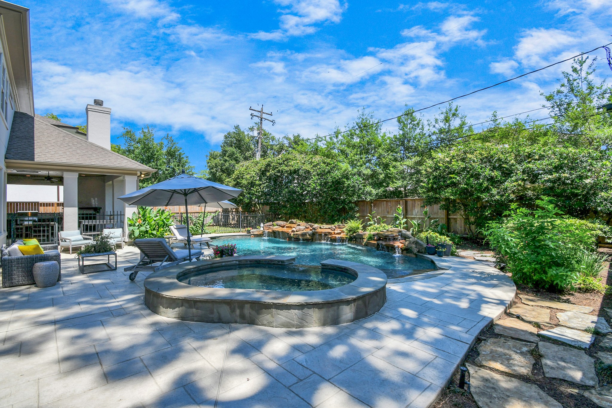 3739 Westerman Street Houston, TX 77005 - Photo 38 of 44 Relax in the oversized hot tub while admiring the tropical backyard.