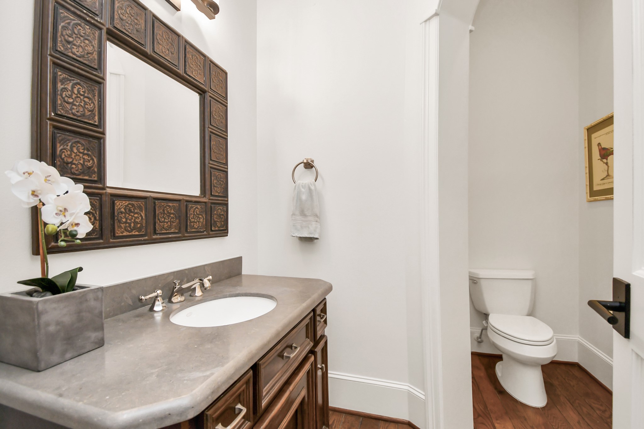 3739 Westerman Street Houston, TX 77005 - Photo 9 of 44 Downstairs half bathroom near the dining room, featuring a honed granite countertop.