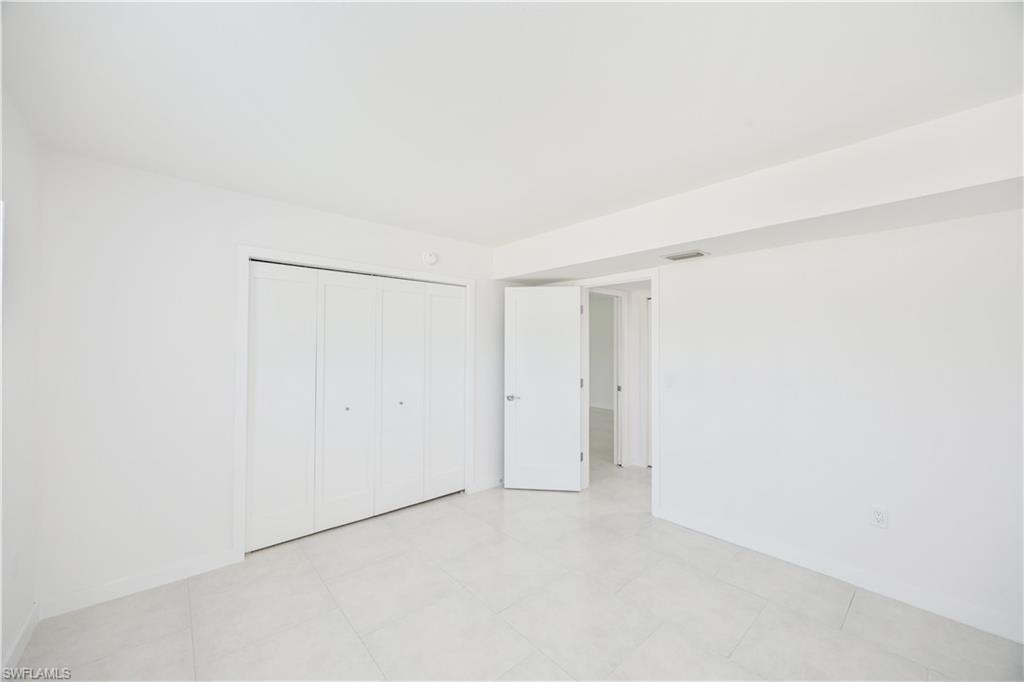 4180 Crayton Road, Unit E4 Naples, FL 34103 - Photo 19 of 25 Guest Suite
