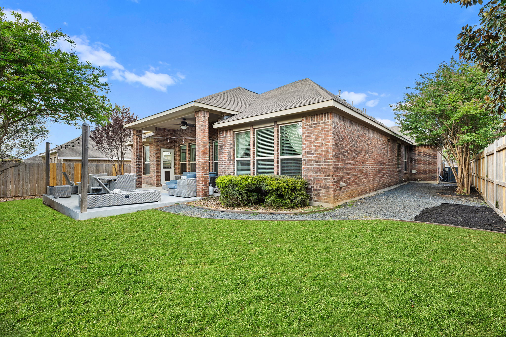229 Sangiovese Leander, TX 78641 - Photo 10 of 37 Landscaped and manicured lawn.