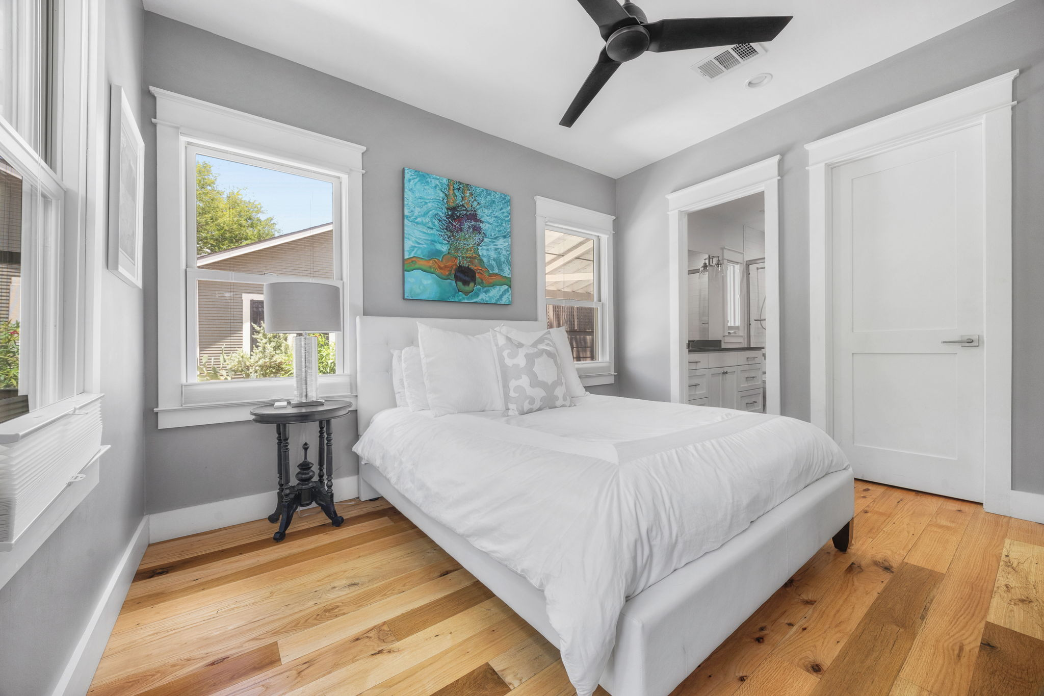 606 East 42nd Street Austin, TX 78751 - Photo 13 of 40 a bedroom with a bed and a table