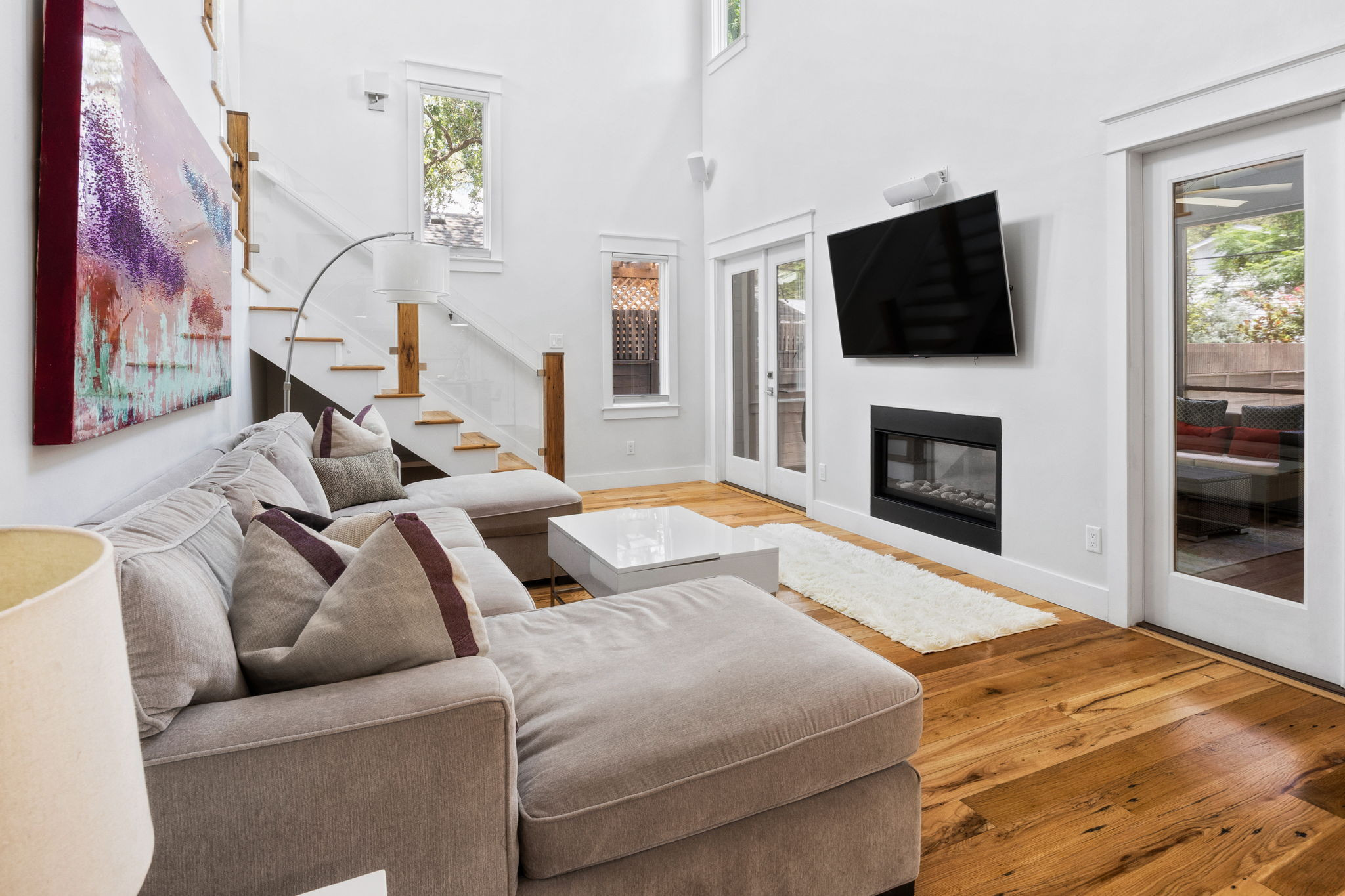 606 East 42nd Street Austin, TX 78751 - Photo 19 of 40 a living room with furniture and a flat screen tv