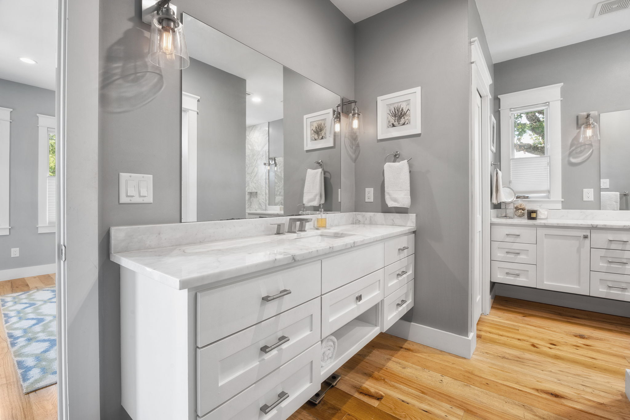 606 East 42nd Street Austin, TX 78751 - Photo 26 of 40 a bathroom with a granite countertop sink mirror and