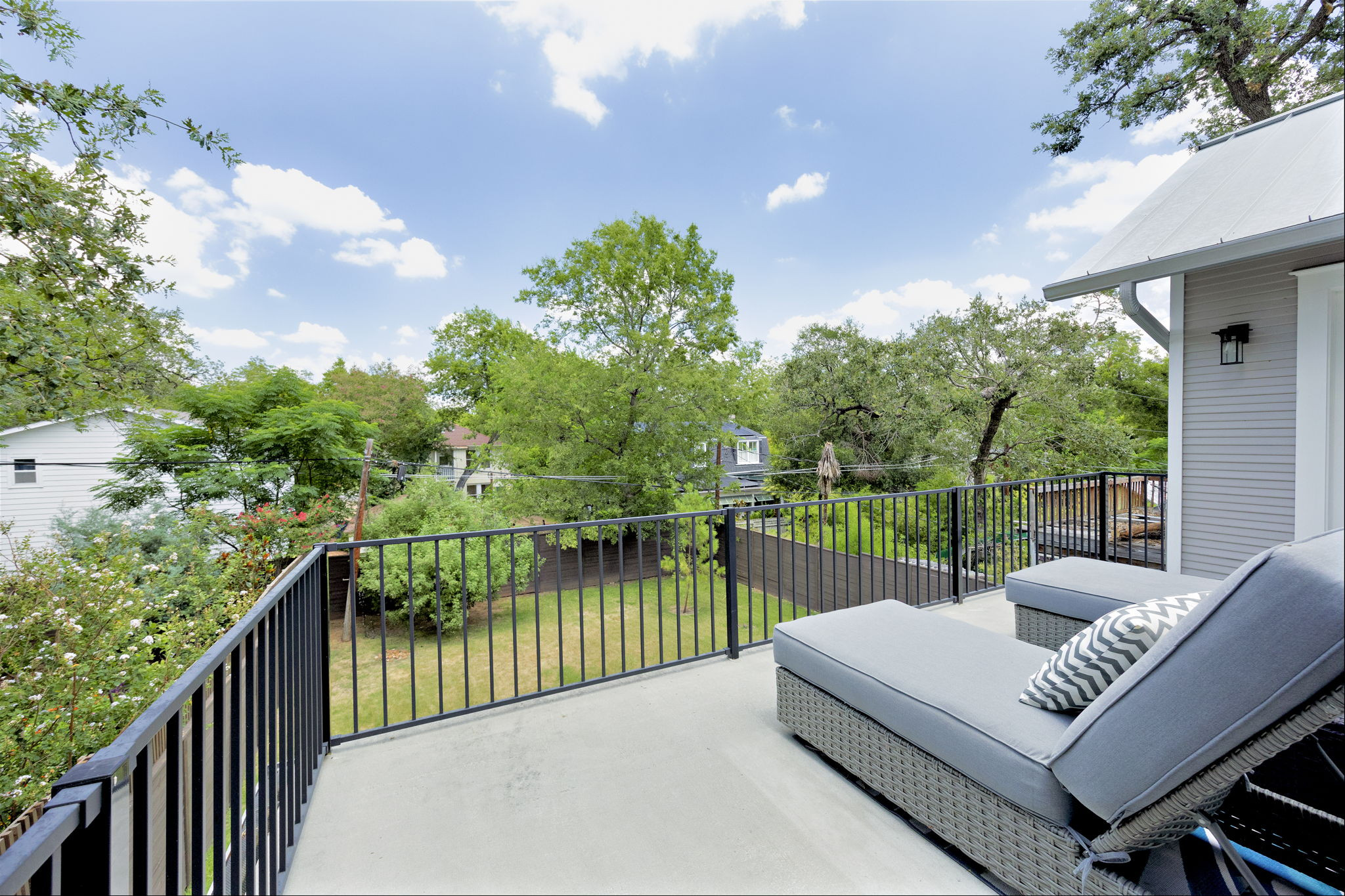 606 East 42nd Street Austin, TX 78751 - Photo 28 of 40 a view of a roof deck with couches and wooden floor