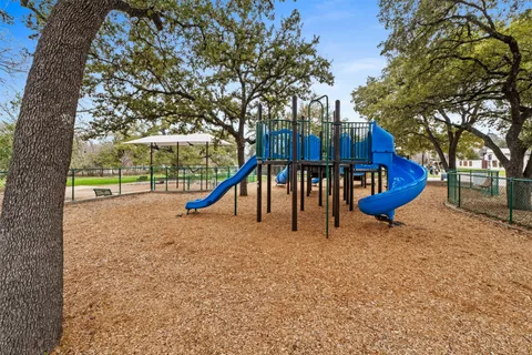 a view of a park with slide