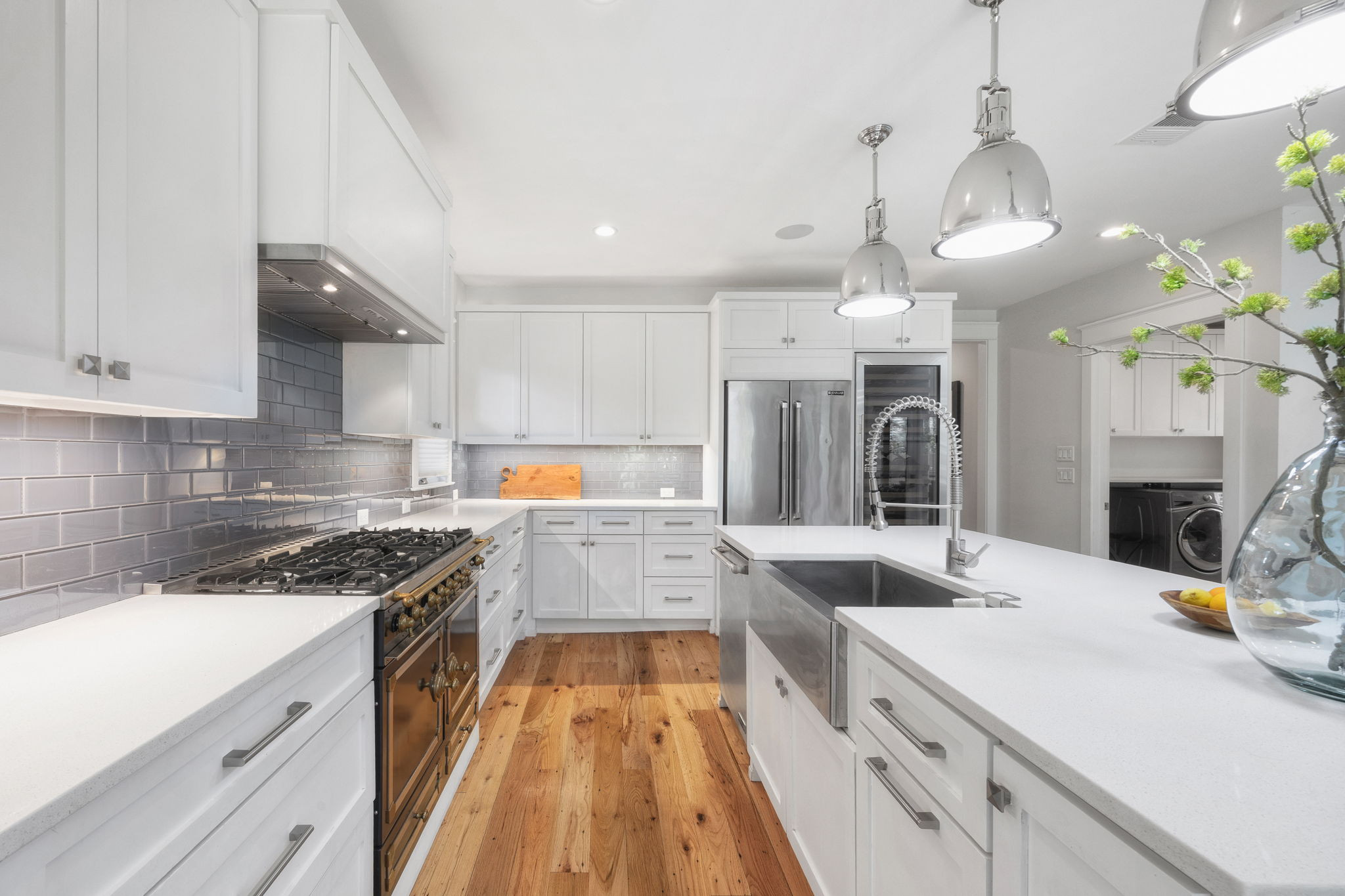 606 East 42nd Street Austin, TX 78751 - Photo 5 of 40 a kitchen with a sink stove and cabinets