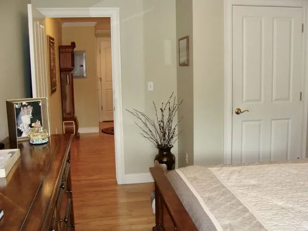 a view of a bedroom and bathroom